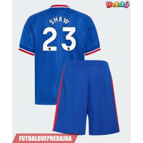 Lacne Dětský Futbalové dres Manchester United Luke Shaw #23 2026-27 Krátky Rukáv - Preč (+ trenírky)